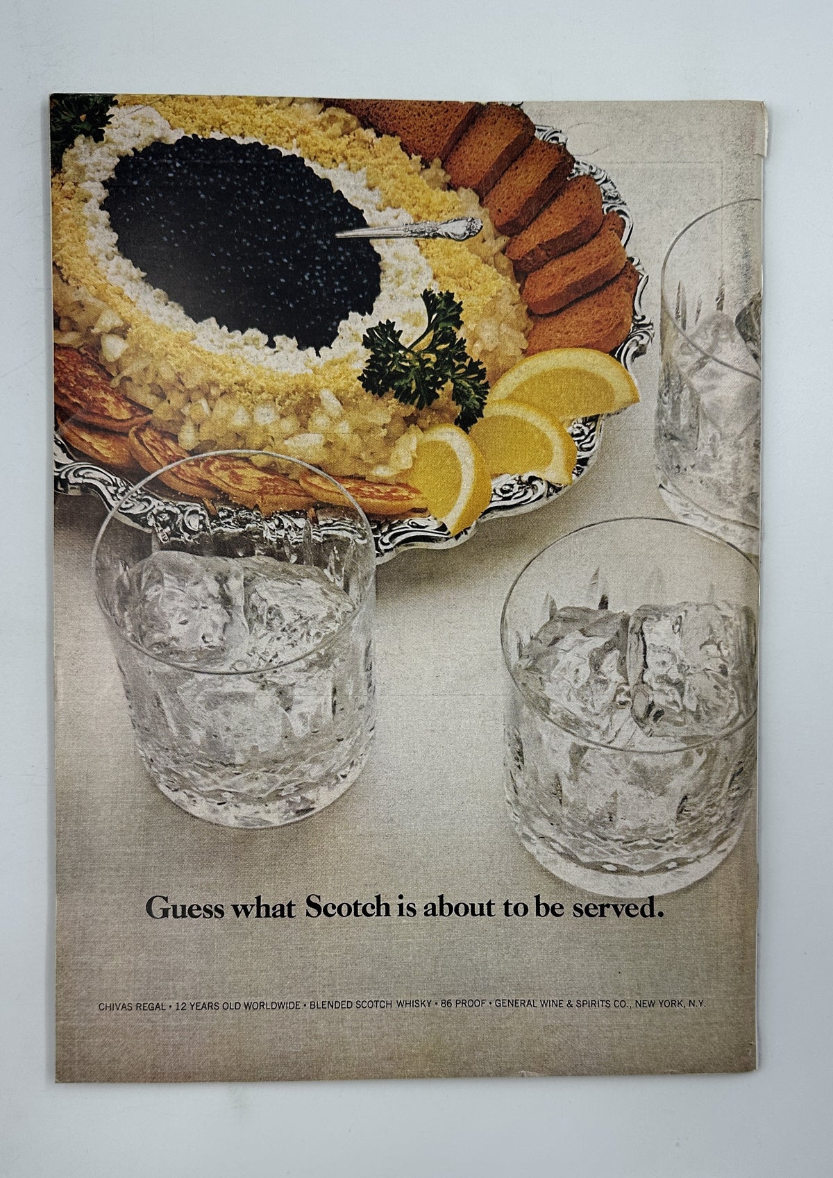 The New Yorker Magazine April 5, 1976 Infinity Businessmen Arnie Levin Cover VG, vintage Scotch advertisement showing a decorated dessert, citrus fruit, and two glasses.