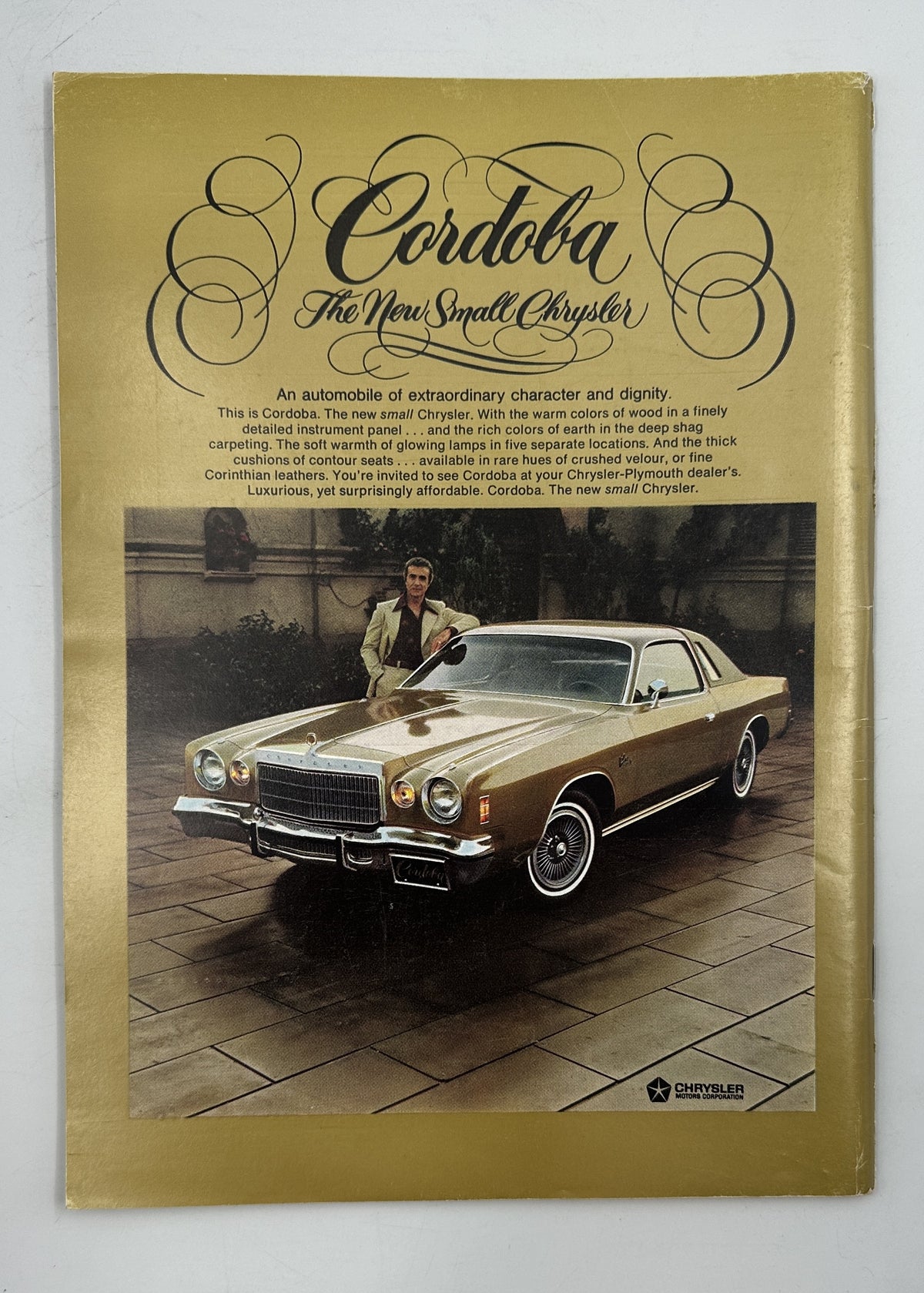 The New Yorker Magazine February 24, 1975 Eustace Tilley Butterfly Rea Irvin Cover interior advertisement for the Cordoba luxury automobile with a vintage car photographed in a showroom