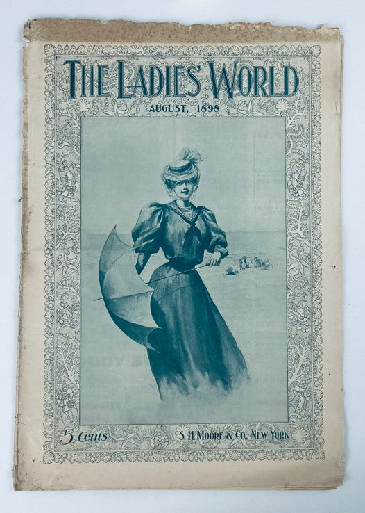 Cover page of VTG The Ladies World Magazine, August 1898, featuring a woman with an umbrella, reflecting the fashion and style of the late 19th century.
