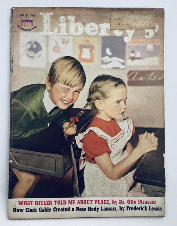 Cover of Liberty Magazine dated April 26, 1941, featuring the title 'How Clark Gable Created a New Hedy Lamarr'. The cover showcases a playful scene with two children, one boy winking and the girl looking serious, emphasizing the magazine's vintage charm.