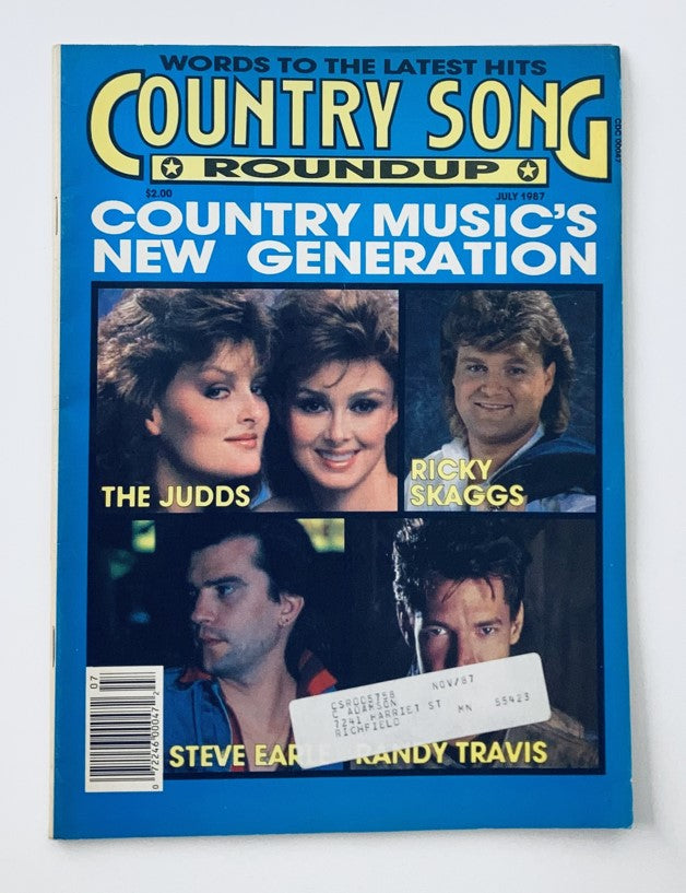 Country Song Roundup Magazine July 1987 featuring The Judds and Ricky Skaggs on the cover, highlighting iconic country music artists of the late 1980s.