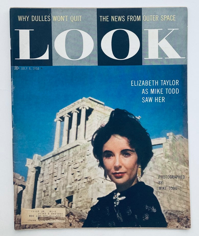 Cover of VTG Look Magazine July 8, 1958, featuring Elizabeth Taylor photographed by Mike Todd against a historical backdrop. This classic vintage magazine showcases fashion and pop culture from the 1950s.