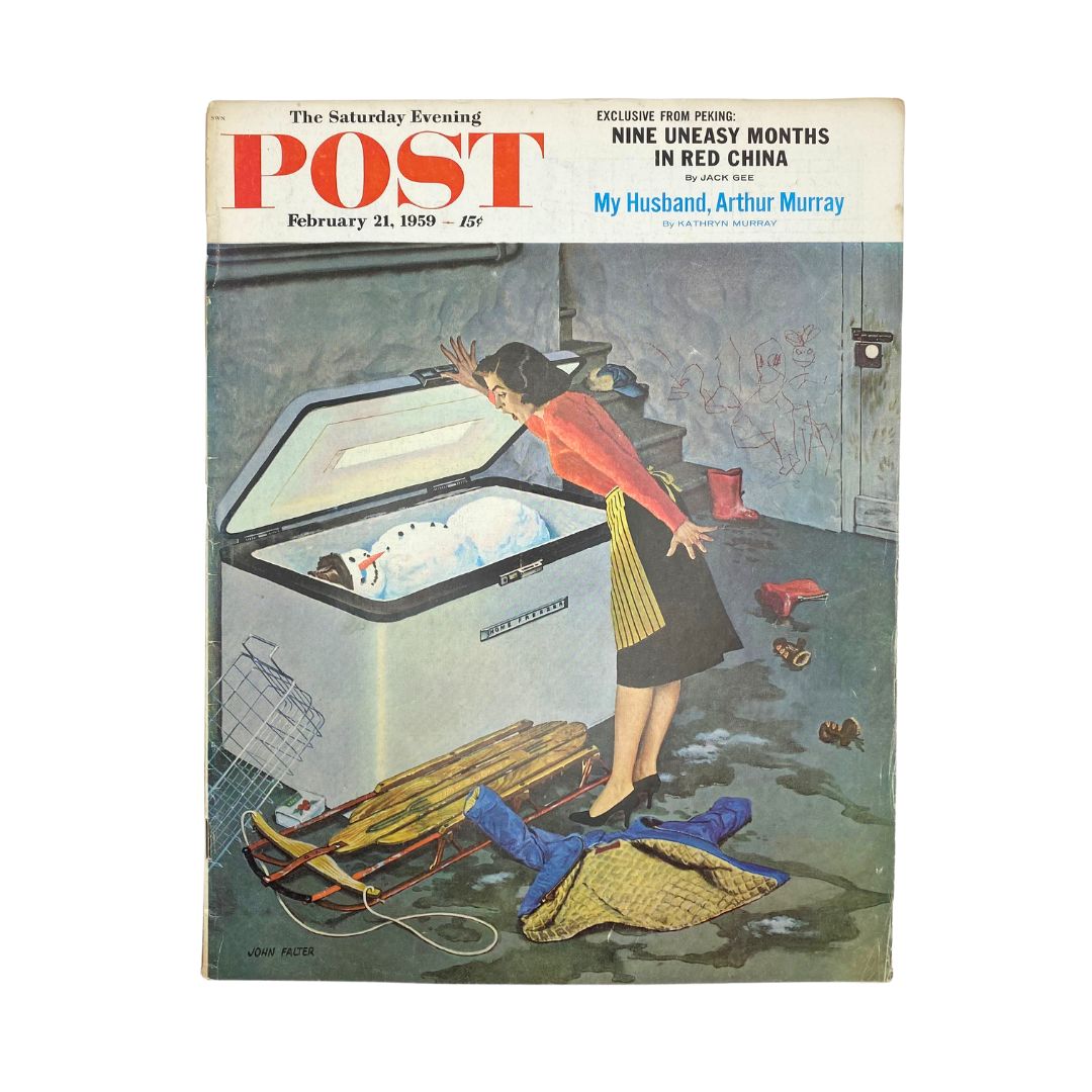 Cover of the Saturday Evening Post Magazine from February 21, 1959, featuring a whimsical illustration of a snowman, created by artist Falter, with a woman looking surprised at an open chest freezer. This vintage magazine captures mid-century Americana.