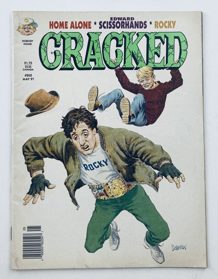 Cover of Cracked Magazine May 1991 No. 262 featuring characters from Home Alone and Rocky, illustrated humorously with vibrant colors, capturing nostalgia from the early 90s.