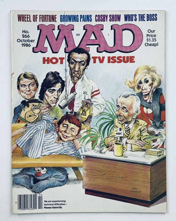 Mad Magazine October 1986 No. 266 cover featuring humorous illustrations related to the game show Wheel of Fortune, showcasing iconic television personalities of the era.