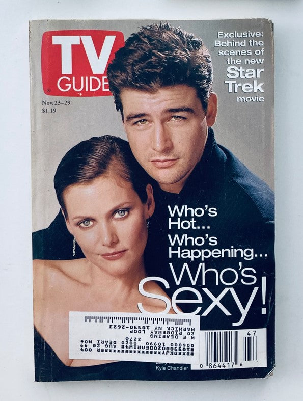 TV Guide Magazine cover from November 23, 1996 featuring Kyle Chandler and Carey Lowell, with the headline 'Who's Hot... Who's Happening... Who's Sexy!' showcasing the personalities from that era.