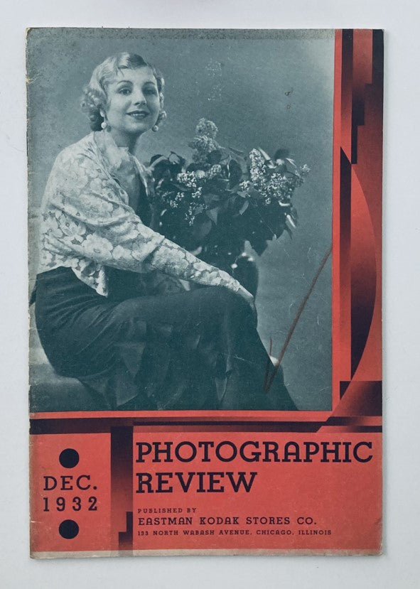 VTG Photographic Review Magazine December 1932 Eastman Portrait, featuring a classic cover design with a photo of a smiling woman wearing a stylish outfit, holding flowers.