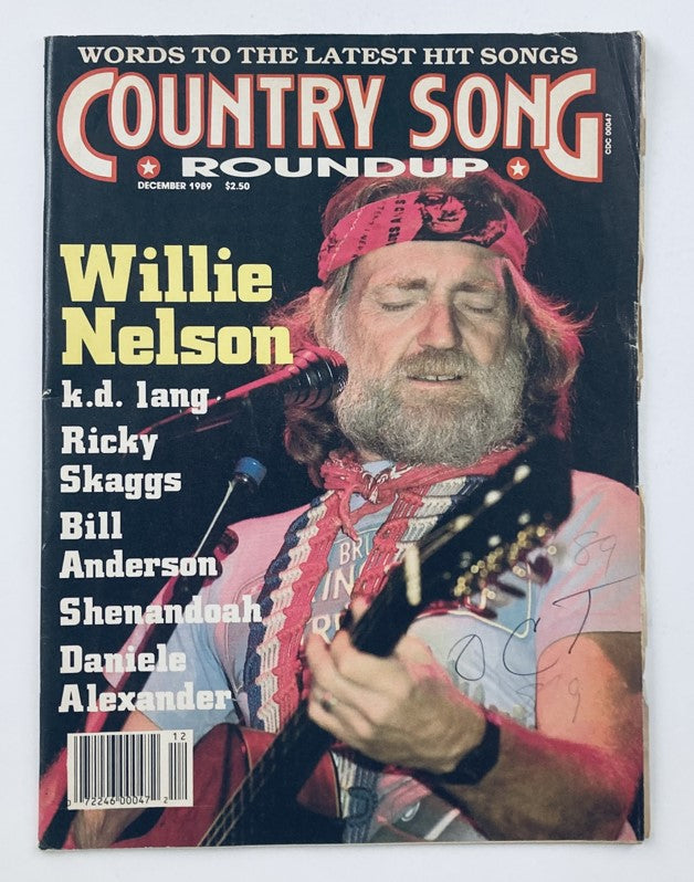 VTG Country Song Roundup Magazine December 1989 featuring Willie Nelson on the cover, showcasing the iconic country singer with a guitar in a performance setting.