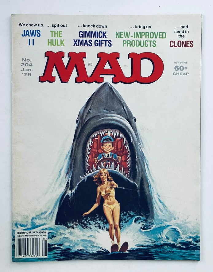 Cover of Mad Magazine January 1979 No. 204 featuring the parody 'We Chew Up Jaws II' with a large shark image and a humorous scene.