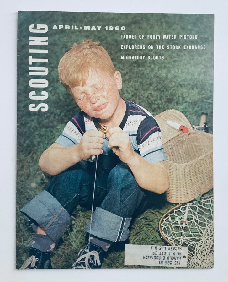 Cover of VTG Scouting Magazine April 1960 Vol 48 No. 4 featuring a young boy playing with a water pistol, titled 'Target of Forty Water Pistols', showcasing the vibrant spirit of scouting.