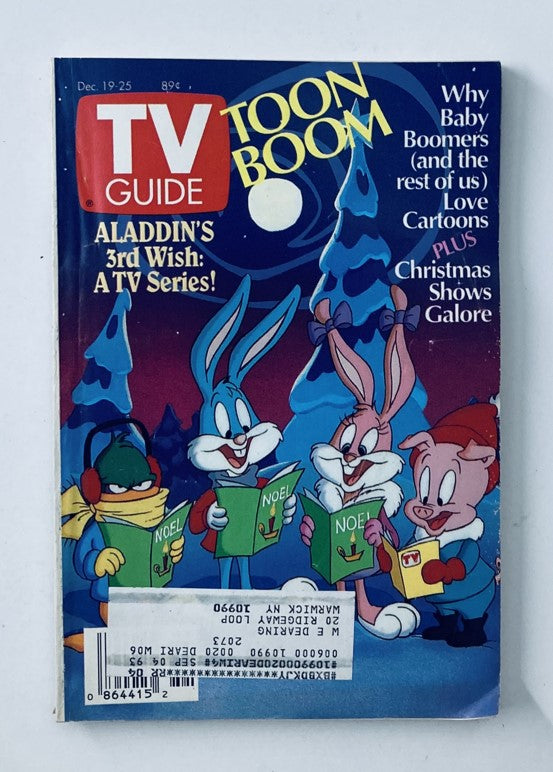 Cover of TV Guide Magazine December 19, 1992 featuring characters celebrating Christmas. The edition titled 'Christmas Shows Galore' showcases festive cartoons and programming, aimed at nostalgic viewers.