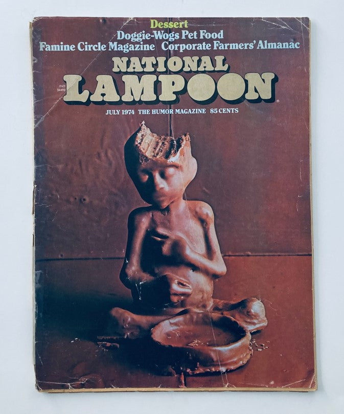 Vtg National Lampoon Magazine July 1974 Corporate Farmer's Almanac cover featuring a surreal clay sculpture against a dark background.