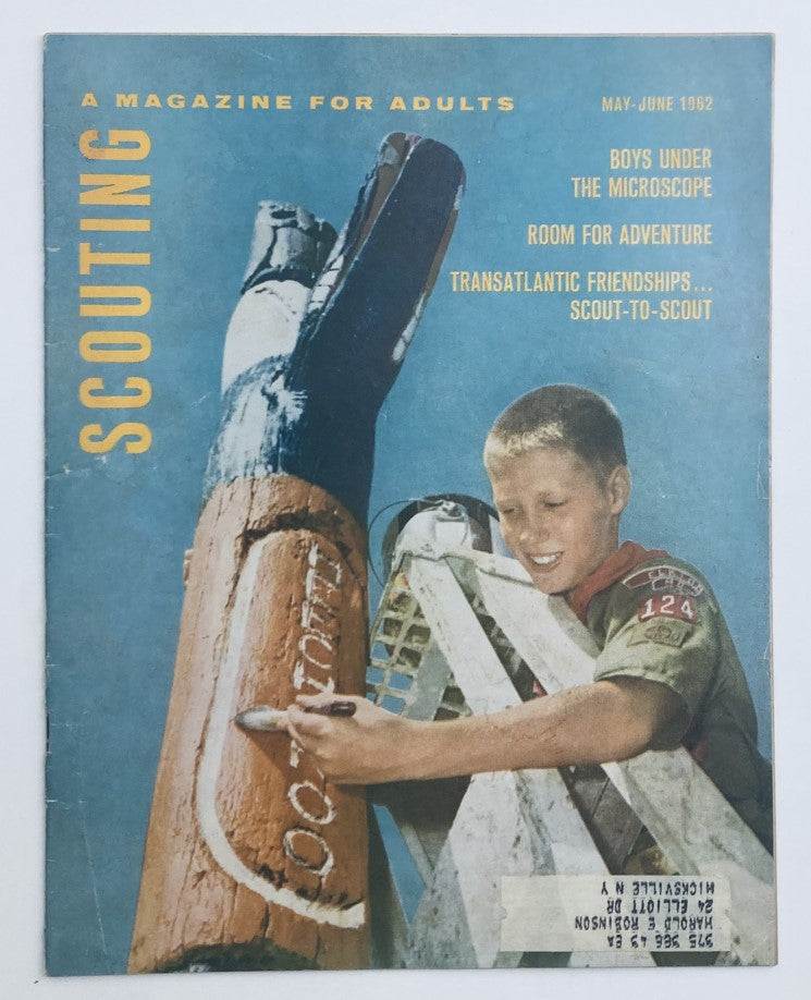 Cover of VTG Scouting Magazine May 1962, Volume 50, Number 5 featuring a young scout working on a totem pole, titled 'Boys Under The Microscope.'