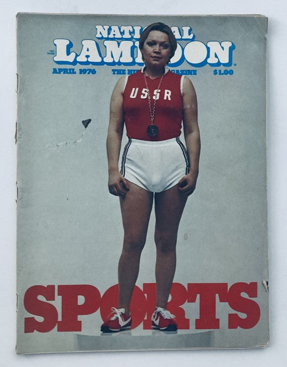 Vintage National Lampoon Magazine cover from April 1976 featuring a female athlete in a red 'USSR' top and white shorts, showcasing Olympic spirit. Unique collectible in creased condition.