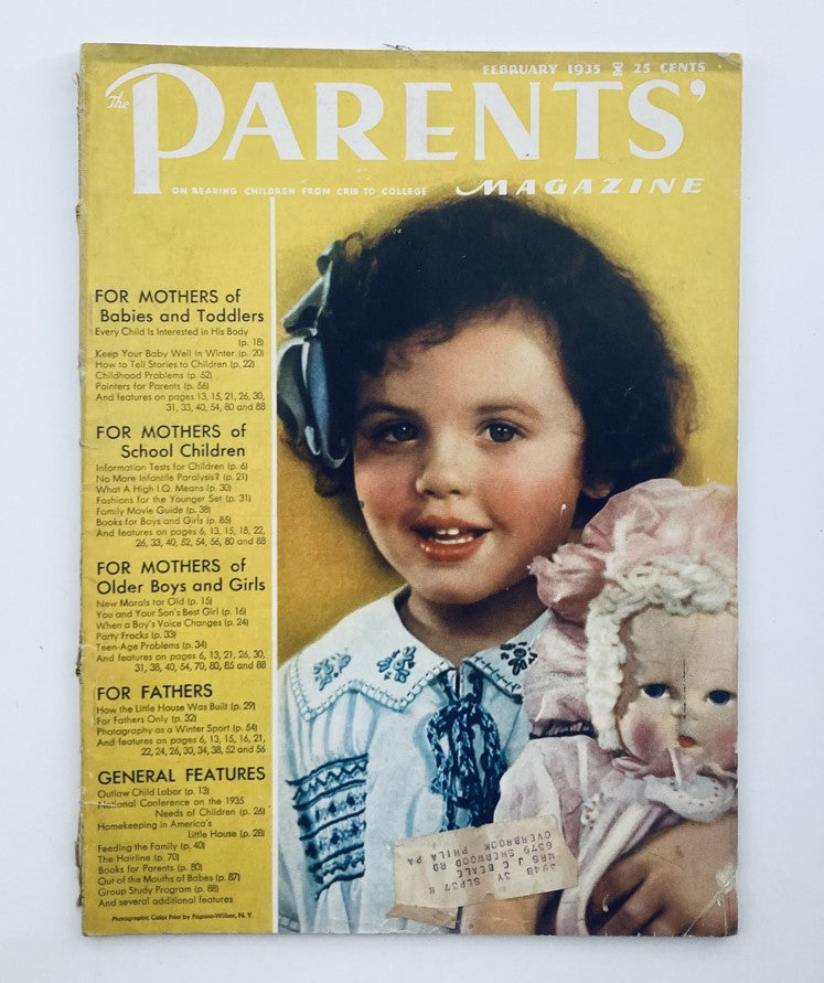 Cover of VTG Parents' Magazine February 1935, showcasing a young girl smiling and holding a doll, with prominent sections for mothers of school children and educational tips.