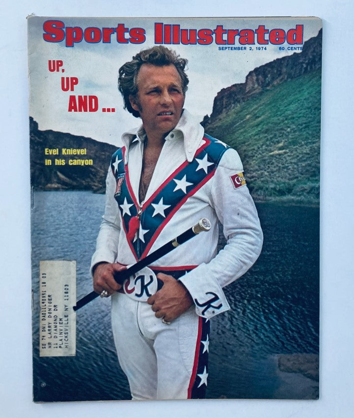 VTG Sports Illustrated Magazine September 2 1974 Vol 41 No. 10 featuring Evel Knievel in a striking outfit with stars and stripes, set against a scenic canyon background.