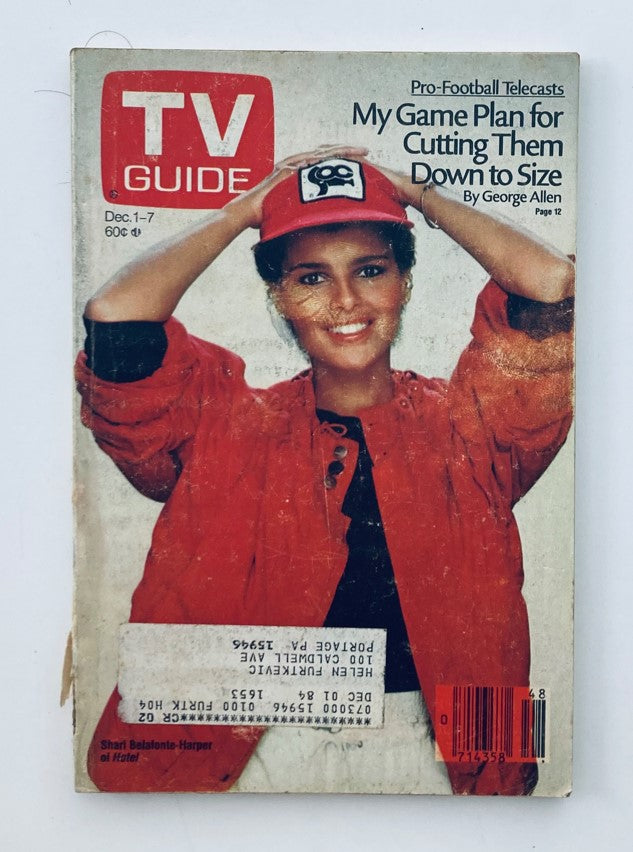 TV Guide Magazine cover, December 1, 1984 featuring Shari Belafonte, showcasing a vibrant image of her in a red jacket and cap, highlighting the edition's relevance as a piece of television history.