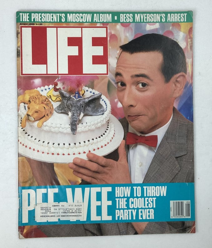 VTG Life Magazine August 1988 featuring Pee-Wee Herman on the cover, showcasing his quirky charm with a whimsical cake. The magazine includes topics on the President's Moscow Album and Bess Myerson's arrest.