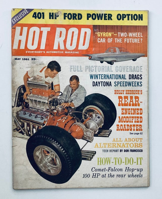 Cover of Hot Rod Magazine May 1961, Volume 14, Number 5 featuring an automotive scene with two men working on a hot rod engine, highlighting 'All About Alternators' and showcasing vintage car culture.