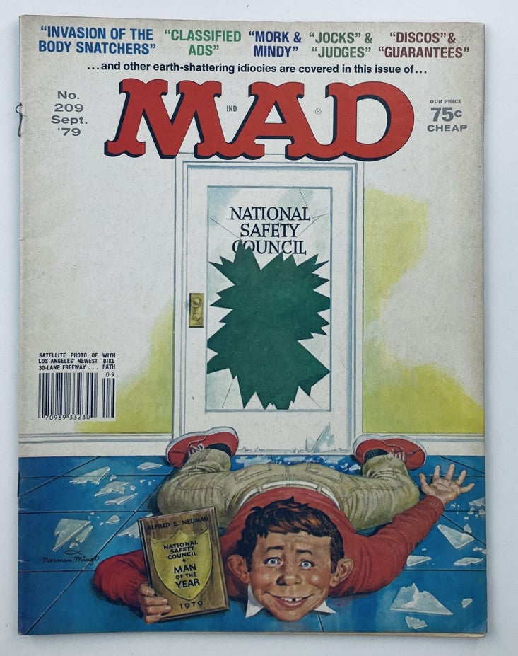Cover of Mad Magazine September 1979 No. 209 featuring Alfred E. Neuman with humorous illustration related to National Safety Council and comic style art, reflecting 1970s pop culture humor.