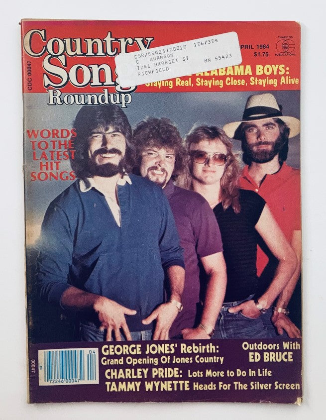 Cover of the VTG Country Song Roundup Magazine from April 1984 featuring the title 'The Alabama Boys Staying Alive'. The magazine showcases four individuals, likely band members, with a prominent headline and colorful design, capturing the essence of classic country music.