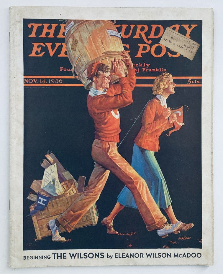Cover of The Saturday Evening Post Magazine dated November 14, 1936, featuring the story 'The Wilsons' by Eleanor W. M. It depicts a couple carrying a barrel and showcasing classic 1930s art style.