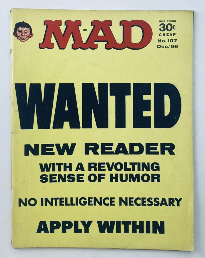 VTG Mad Magazine December 1966 No. 107 cover featuring the bold headline 'WANTED NEW READER' and an illustration of the famous mascot, highlighting its vintage comic appeal.