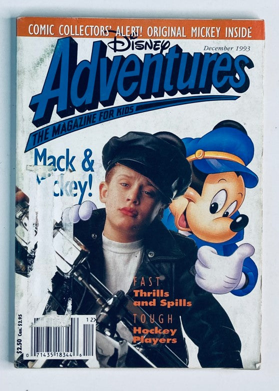 Disney Adventures Magazine December 1993 cover featuring Macaulay Culkin and Mickey Mouse, showcasing a nostalgic design from the early '90s, perfect for collectors.