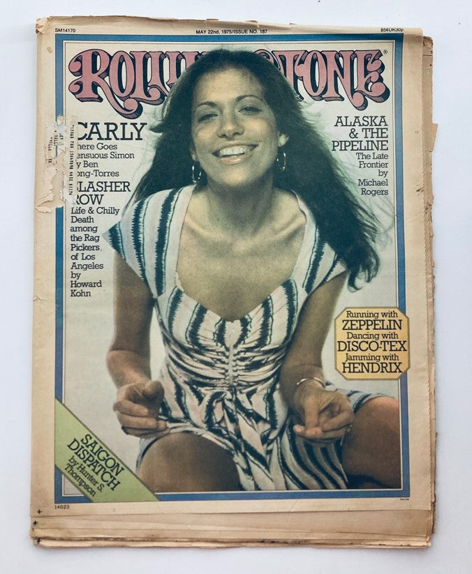 Vintage Rolling Stone Magazine cover from May 22, 1975, featuring Carly Simon in a striped dress and text highlighting artists like Chuck Mangione and Jimi Hendrix.