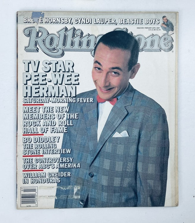 Cover of Vintage Rolling Stone Magazine February 12 1987 Issue 493 featuring TV star Pee-Wee Herman with a stylish bow tie, showcasing articles about music and pop culture.