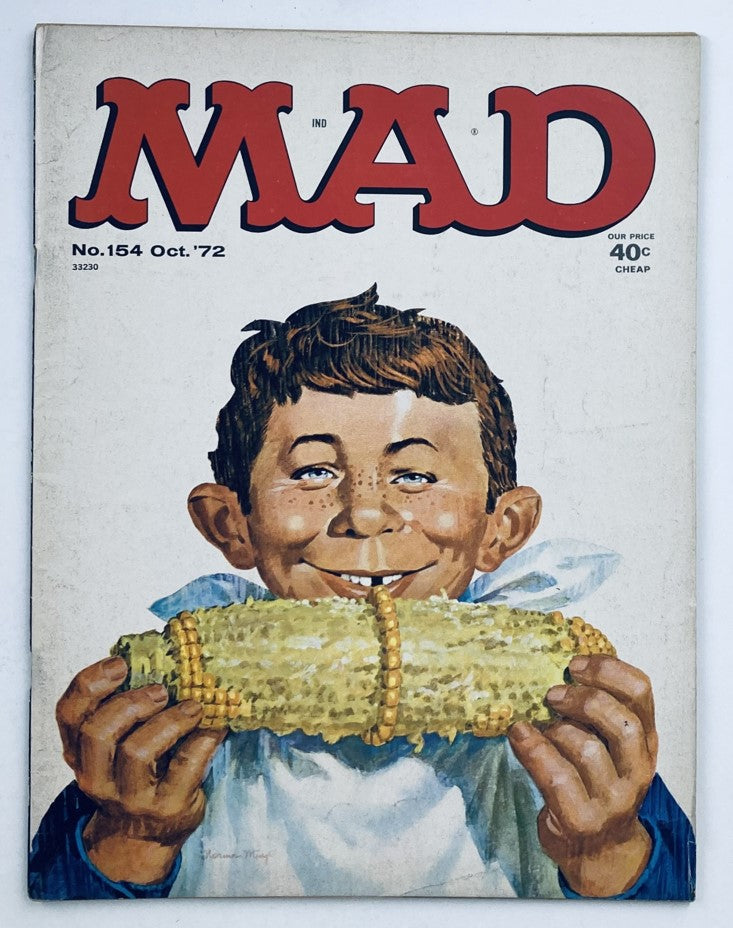 Front cover of Mad Magazine October 1972 No. 154, featuring a smiling boy holding a corn cob, representing vintage political satire and humor.