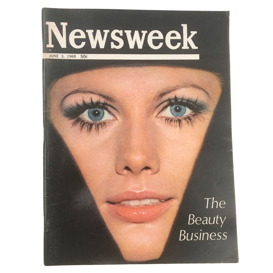 Cover of Newsweek Magazine from June 3, 1968, featuring the title 'The Beauty Business' with a close-up image of a woman showcasing bold makeup and striking blue eyes.