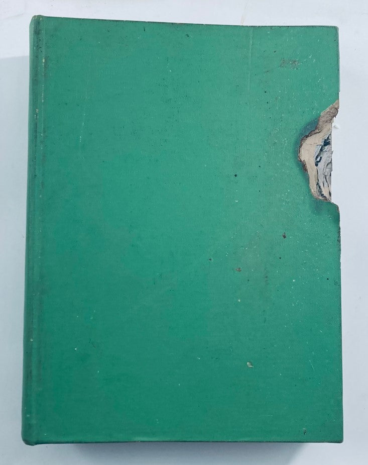 Close-up view of the vintage 1950 Bound Life Magazine October to December collection showing the worn green cover with a corner damage. Highlighting the charm and historical character of the archival magazine set.