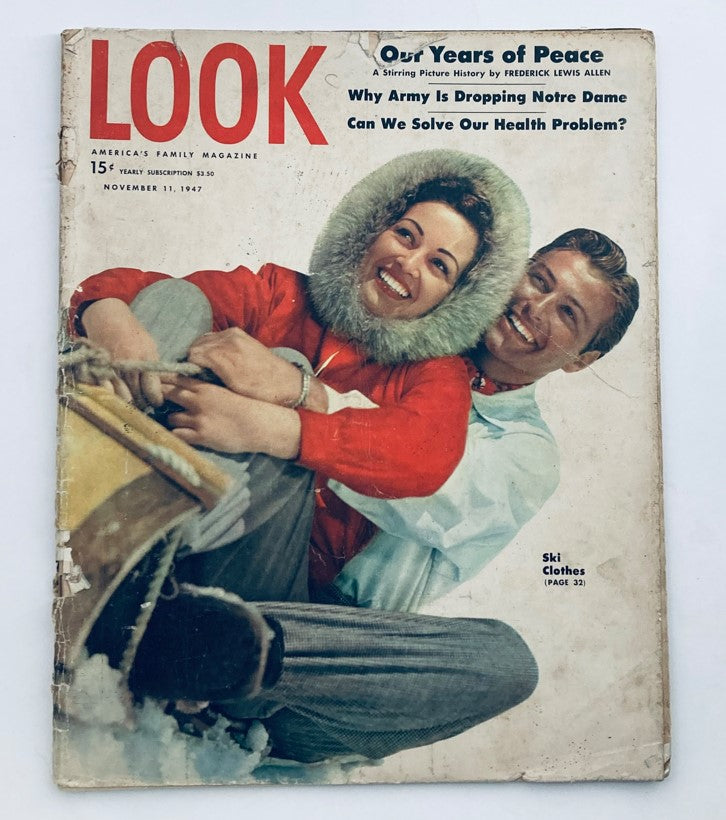 VTG Look Magazine November 11 1947 featuring a vintage cover with a smiling couple in stylish ski clothing, promoting trends from the late 1940s. The magazine highlights ski fashions and includes articles from that era.