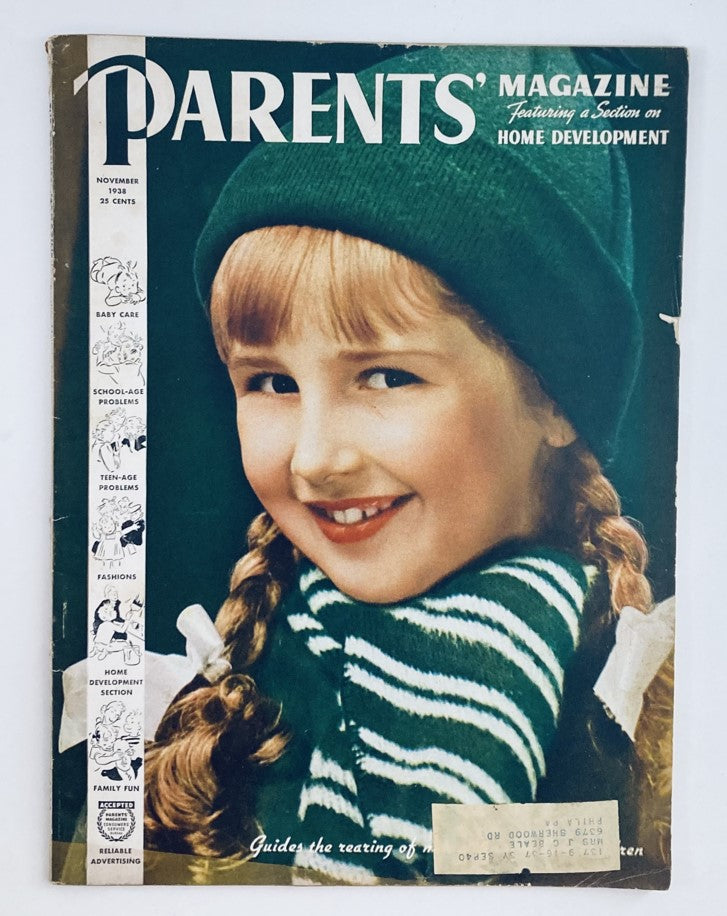 Cover of VTG Parents' Magazine November 1938 featuring a smiling girl wearing a green hat and striped sweater, themed 'Sunshine The Whole Year Round'.