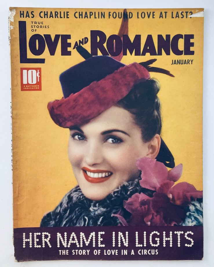 Cover of VTG Love and Romance Magazine January 1939 titled 'Her Name in Lights', featuring a smiling woman in a red hat with flowers, highlighting the theme of true love stories.