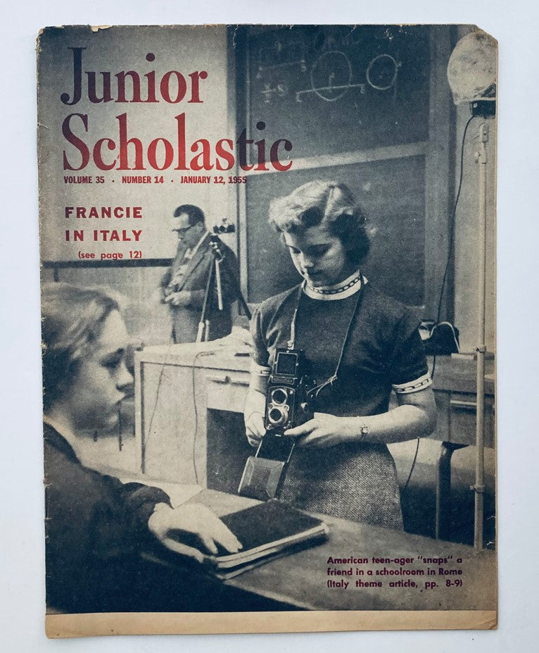 Cover of VTG Junior Scholastic Magazine January 12 1955 featuring Francie in Italy, showcasing a young girl with a camera in a schoolroom, highlighting the educational theme of the era.