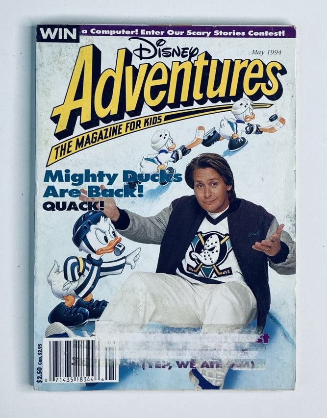 Disney Adventures Magazine May 1994 cover featuring Emilio Estevez and The Original Mighty Ducks with playful characters and colorful design.
