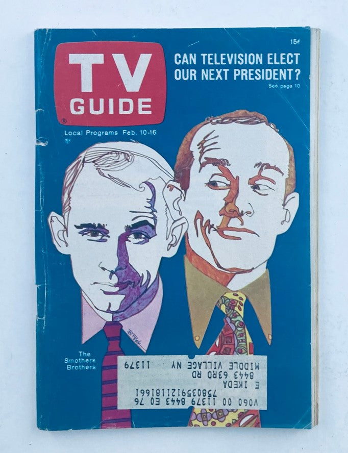 TV Guide Magazine February 10 1968 featuring Dick and Tom Smothers on the cover, with a blue background and the title prominently displayed. This vintage issue explores the impact of television on presidential elections.