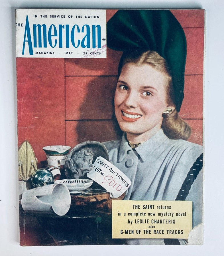 Vintage The American Magazine May 1947 cover featuring Joy Mitchell art, showcasing a smiling woman with elegant fashion and various artifacts, highlighting its status as a collectible publication.