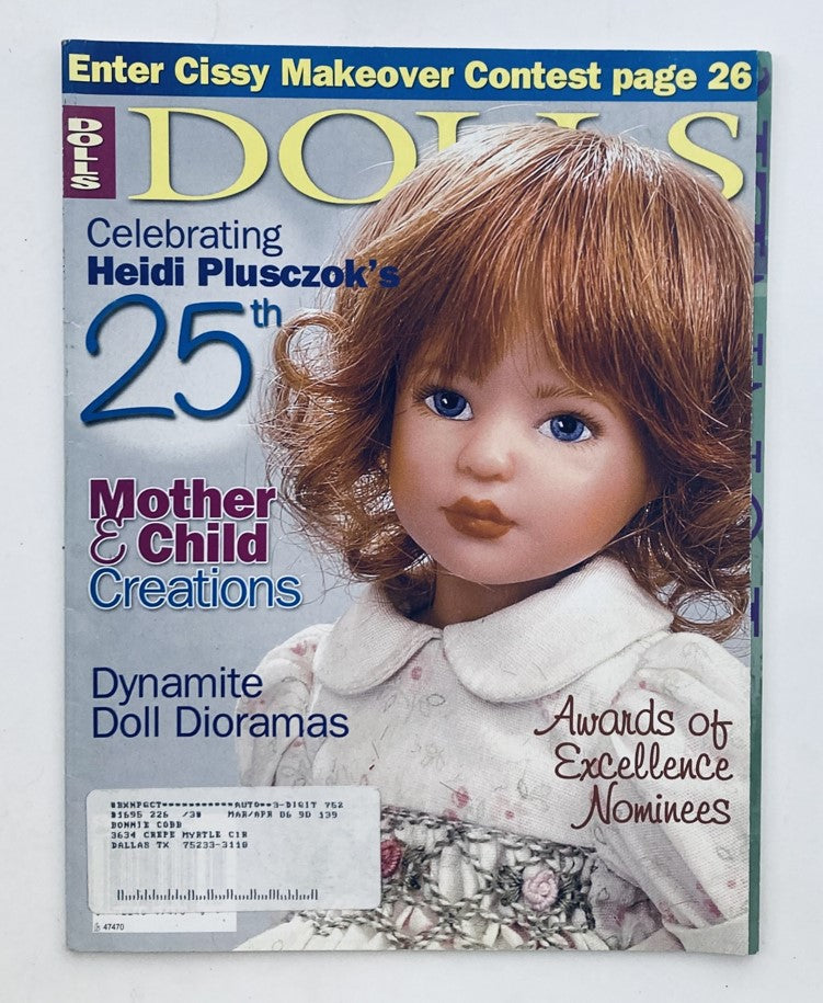 Cover of Dolls Magazine May 2005 Vol 24 No. 4 showcasing Heidi Plusczok's Mother & Child doll creation, featuring a doll with brown hair dressed in a white outfit, celebrating the 25th anniversary of Heidi Plusczok's innovative designs.