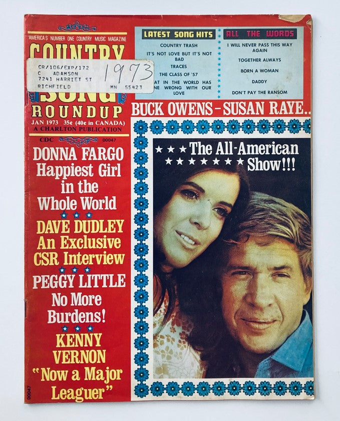 Cover of VTG Country Song Roundup Magazine January 1973 featuring Buck Owens and Susan Raye, showcasing country music history with vibrant graphics and song highlights.