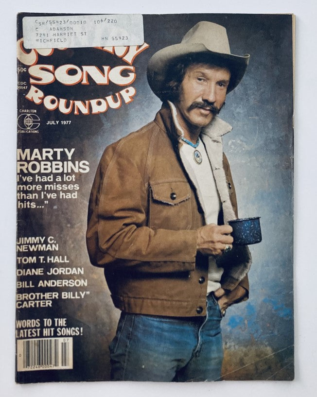 Cover of VTG Country Song Roundup Magazine July 1977 featuring Marty Robbins and Jimmy C. Newman, showcasing classic country music nostalgia.