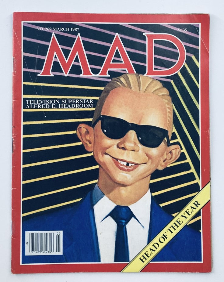 Mad Magazine March 1987 No. 269 featuring Alfred E. Headroom, showcasing vibrant cover art with sunglasses and a suit, representing pop culture from the late 1980s.