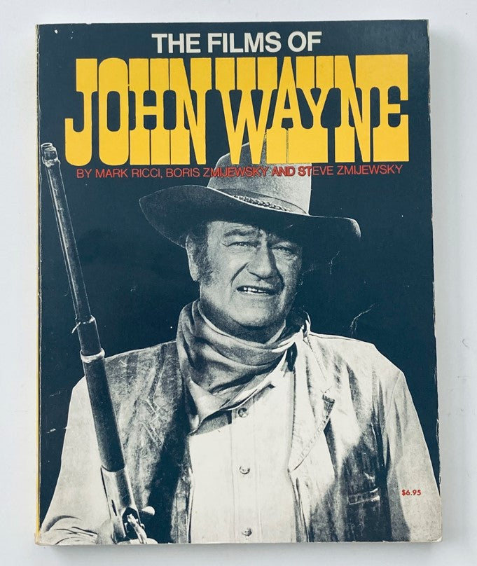 Cover of the vintage 1976 publication 'The Films of John Wayne' by Mark Ricci, Boris Zmijewsky, and Steve Zmijewsky, featuring an iconic image of John Wayne with a rifle in a cowboy outfit.