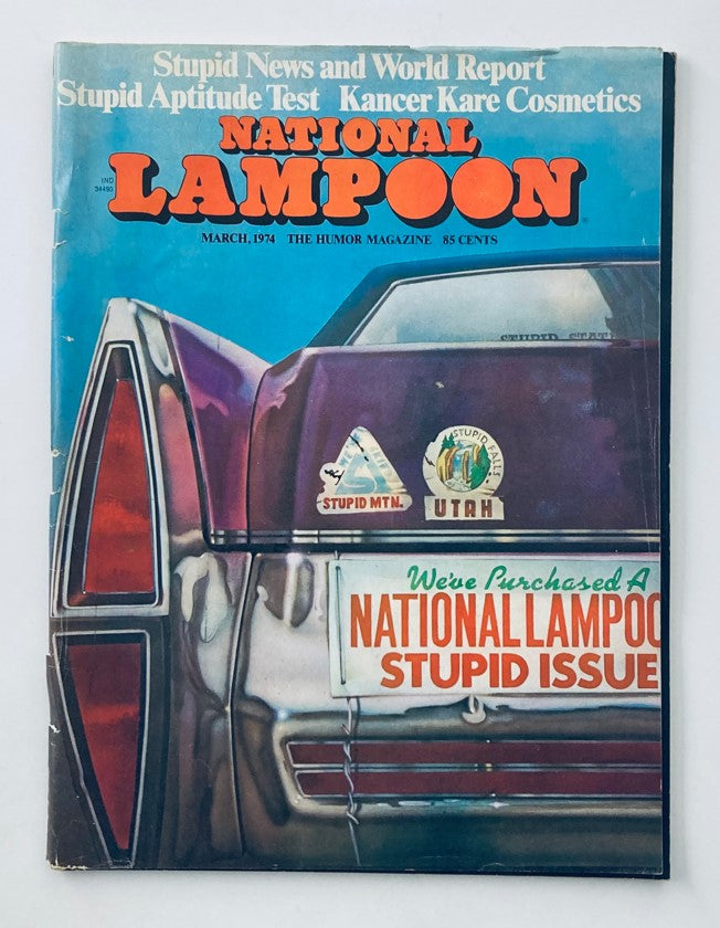Vtg National Lampoon Magazine March 1974 cover featuring a humorous illustration of a car with funny bumper stickers, showcasing the title 'National Lampoon' and issue details.