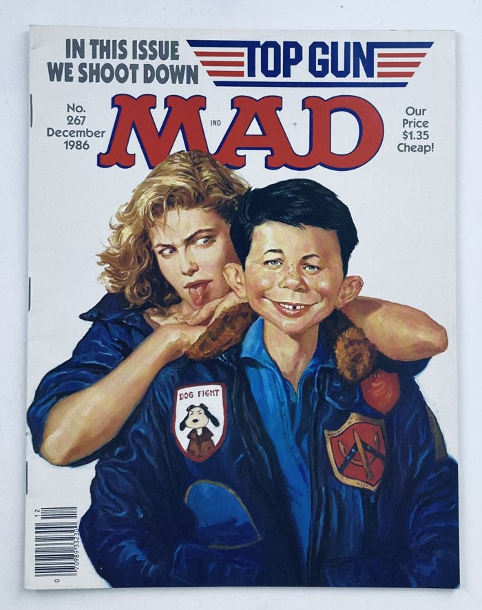 Cover of Mad Magazine December 1986 No. 267 featuring the parody 'We Shoot Down Top Gun' with illustrated characters and a comedic pose.