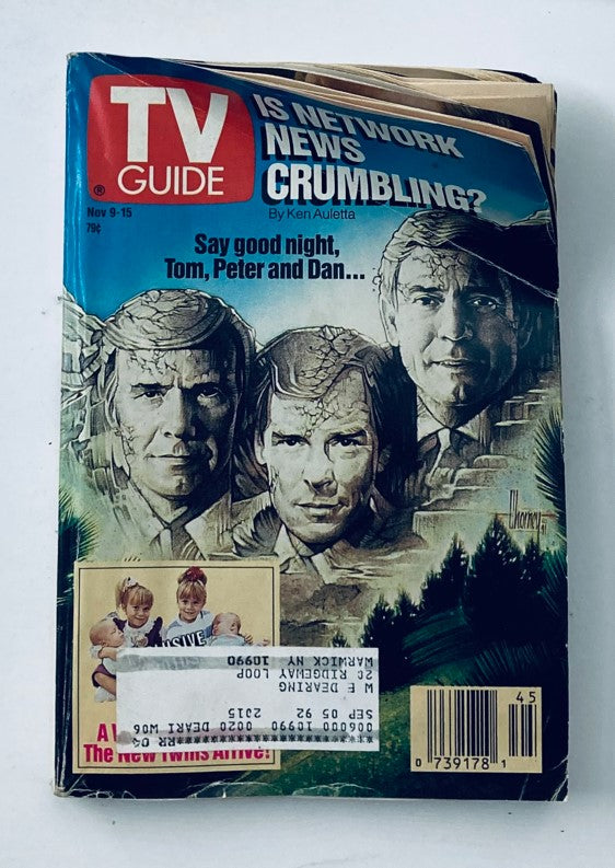 Cover of TV Guide Magazine dated November 9, 1991 featuring a headline about network news and the Olsen twins. A nostalgic collectible magazine showcasing the early 90s television landscape.