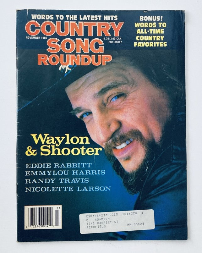 Cover of VTG Country Song Roundup Magazine November 1986 featuring Waylon Jennings and Shooter Jennings with prominent title and list of featured artists.