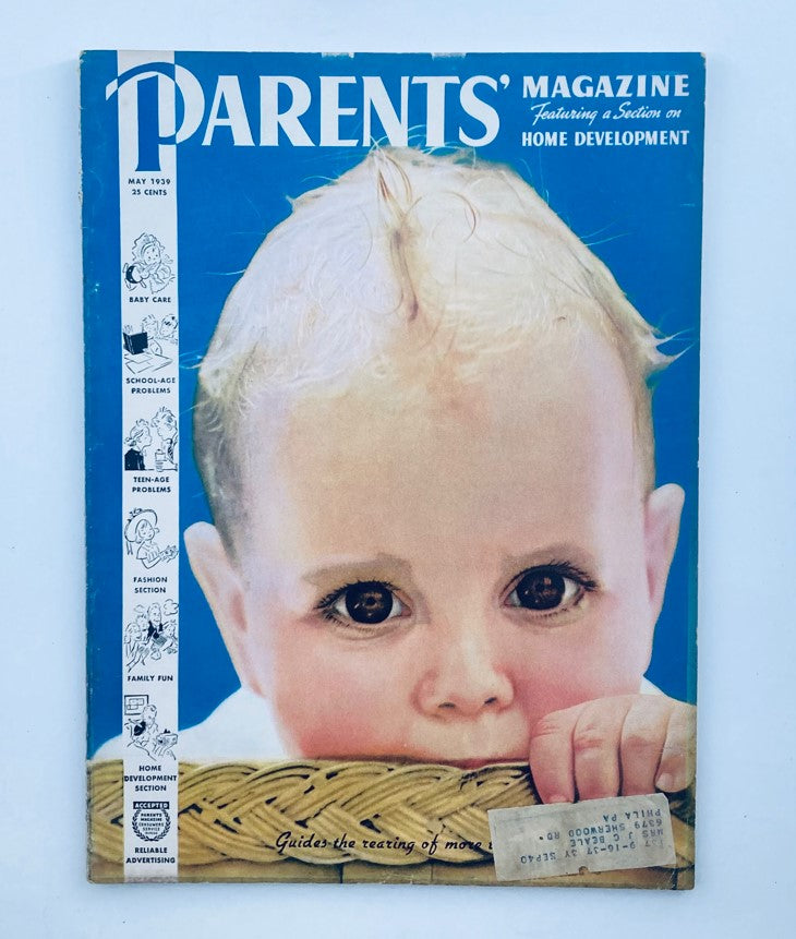 Cover of VTG Parents' Magazine May 1939, Volume 14, Number 5, featuring an illustration of a child in a basket, emphasizing parenting and childhood development.